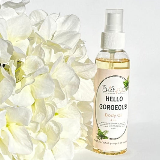 Hello Gorgeous Body Oil in a sleek pump bottle – fast-absorbing iris and amber body oil for radiant, hydrated, and glowing skin